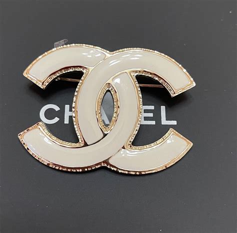 chanel logo brooch|Meer.